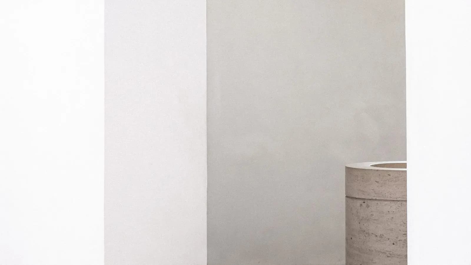 Elegant white minimalist archway in soft daylight